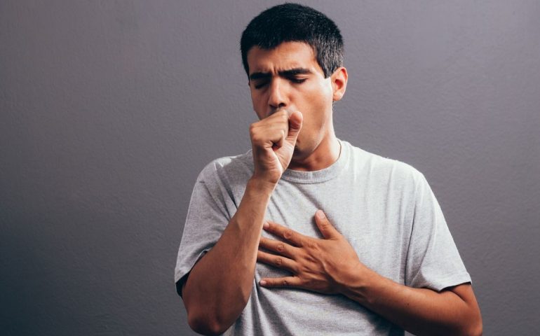 Man coughing