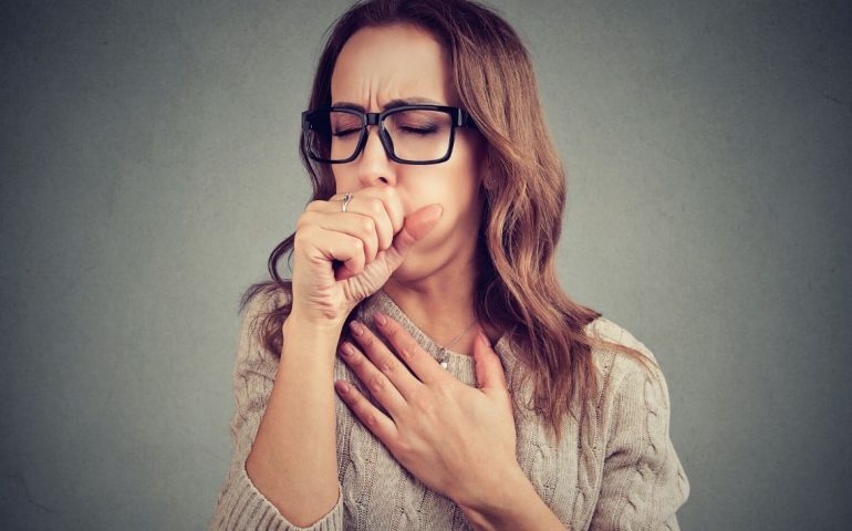 Woman coughing